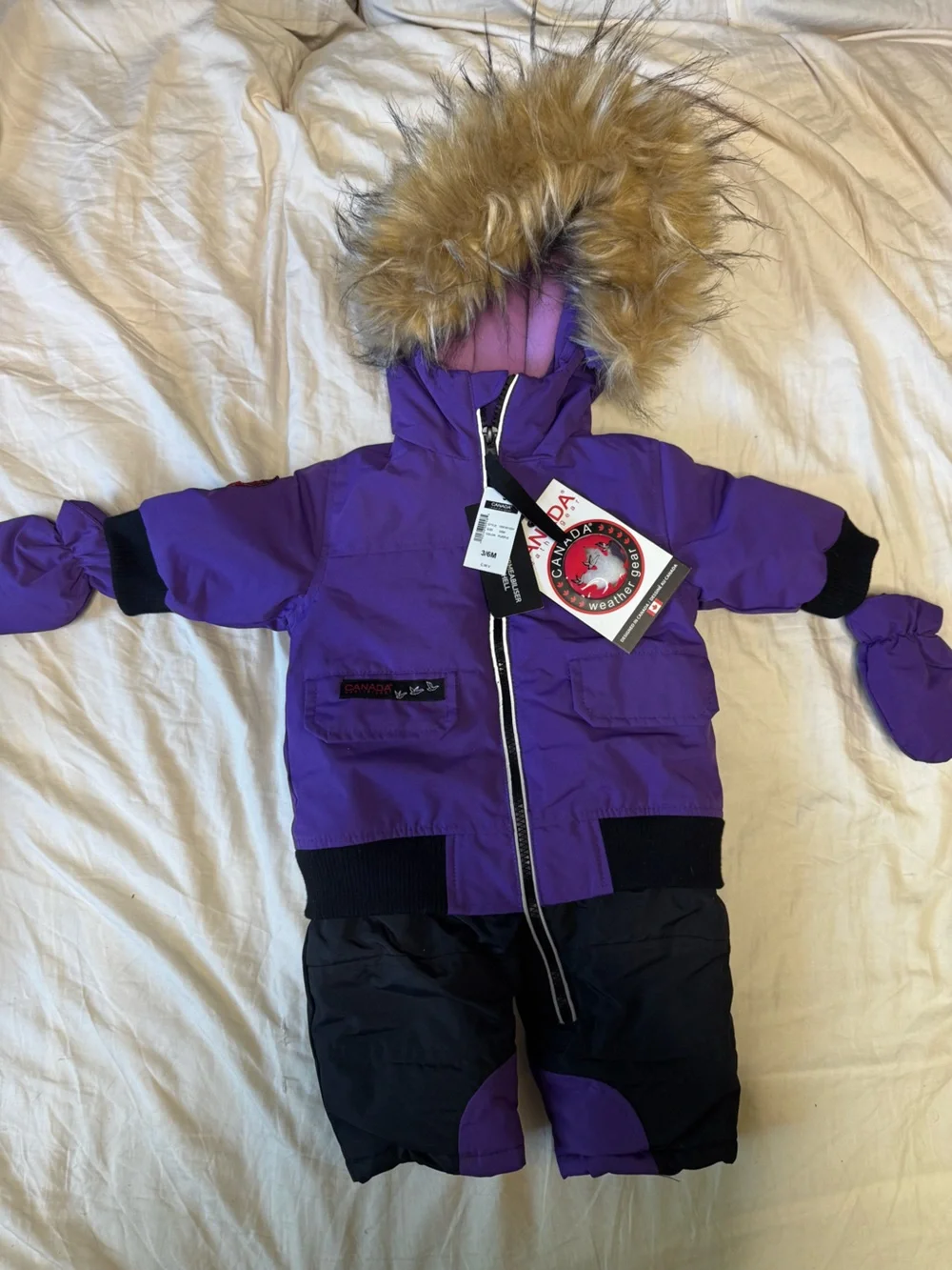 Kids purple and black Canada Weather Gear infant full-body snowsuit